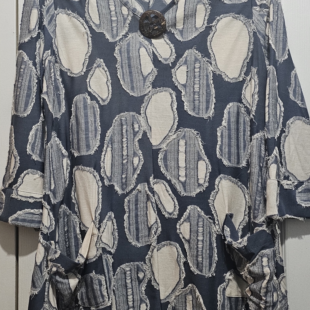 Blue and Cream Patterned Garment